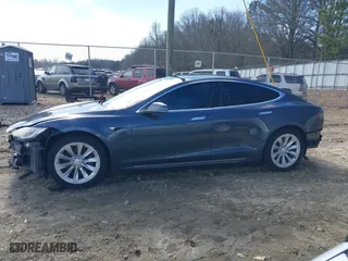2017 Tesla Model S 100D with VIN 5YJSA1E23HF198592, listed as a IAAI auction lot 41721755 with 127,946 mi miles. Bid and sale history available at carsss.com. Image 15.