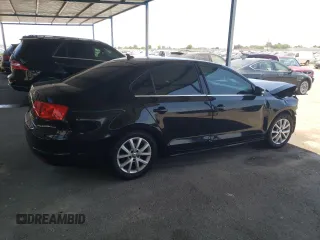 2014 Volkswagen Jetta SE with VIN 3VWD17AJXEM445488, listed as a Copart auction lot 65282425 with 159,356 mi miles and Salvage title. Bid and sale history available at DreamBid. Image 3.