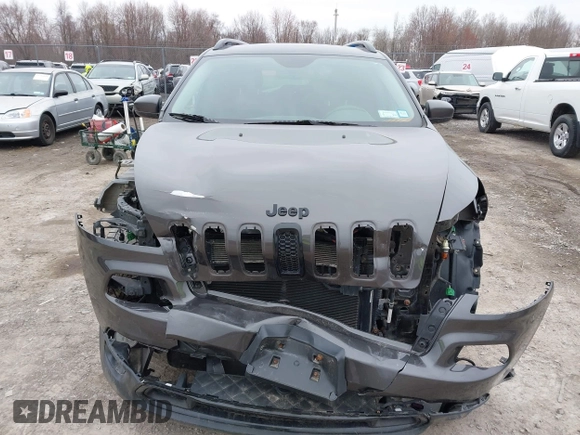 2016 Jeep Cherokee 75th Anniversary with VIN 1C4PJMCB0GW156076, listed as a IAAI auction lot 41946760 with 105,571 mi miles. Bid and sale history available at carsss.com. Image 13.