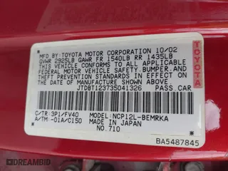 2003 Toyota ECHO with VIN JTDBT123735041326, listed as a IAAI auction lot 42029676 with 1 mi miles. Bid and sale history available at carsss.com. Image 9.