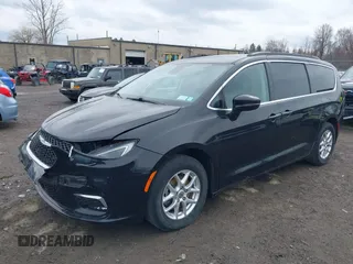 2022 Chrysler Pacifica Touring L with VIN 2C4RC1BG2NR117879, listed as a IAAI auction lot 41845778 with 96,523 mi miles and . Bid and sale history available at DreamBid. Image 17.
