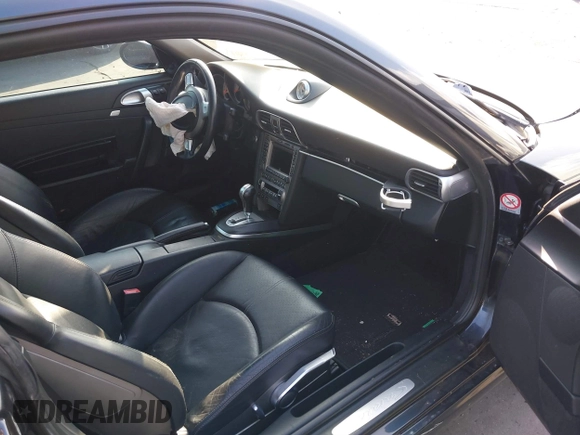 2006 Porsche 911 Carrera S with VIN WP0AB29986S740565, listed as a IAAI auction lot 41488077 with 81,471 mi miles. Bid and sale history available at carsss.com. Image 5.