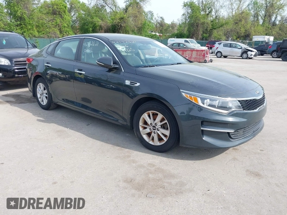 2016 Kia Optima LX with VIN KNAGT4L37G5073752, listed as a IAAI auction lot 42132621 with 136,818 mi miles. Bid and sale history available at carsss.com. Image 1.
