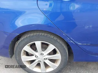 2012 Hyundai Accent GLS z VIN KMHCU4AE8CU115781, wystawiony jako IAAI lot #42057951 z przebiegiem 150 441 mil mil oraz . Historia ofert i sprzedaży dostępna na DreamBid. Obrazek 16.