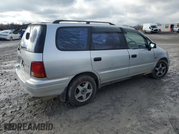 1995 Honda Odyssey with VIN RA21049652, listed as a Copart auction lot 85426404 with 271,632 mi miles and Clean title. Bid and sale history available at DreamBid. Image 3.