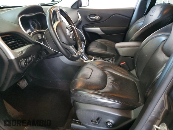 2018 Jeep Cherokee Overland with VIN 1C4PJMJXXJD594749, listed as a Copart auction lot 56049145 with 178,471 mi miles and Salvage title. Bid and sale history available at DreamBid. Image 7.