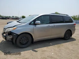 2012 Toyota Sienna LE AAS with VIN 5TDKK3DC8CS256848, listed as a Copart auction lot 58657055 with 295,584 mi miles and Salvage title. Bid and sale history available at DreamBid. Image 1.