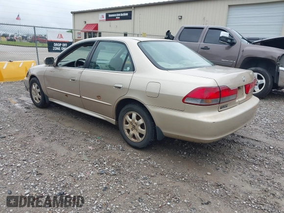 2002 Honda Accord EX z VIN 1HGCG56632A133738, wystawiony jako IAAI lot #42104355 z przebiegiem 236 202 mil mil oraz . Historia ofert i sprzedaży dostępna na DreamBid. Obrazek 3.