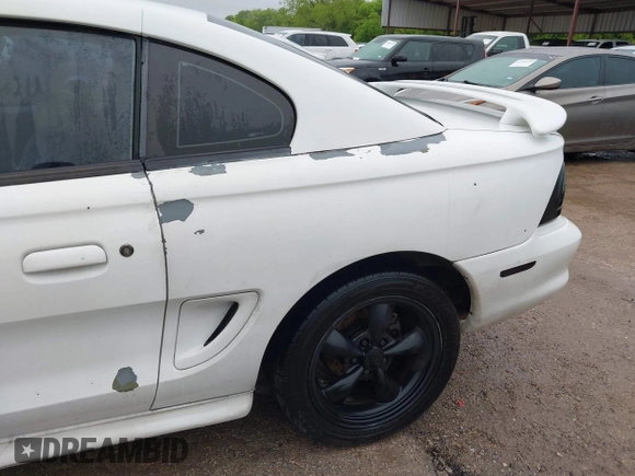 1997 Ford Mustang GT with VIN 1FALP42X7VF193106, listed as a IAAI auction lot 41960062 with 150,687 mi miles and . Bid and sale history available at DreamBid. Image 14.