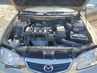 2001 Mazda 626 LX with VIN 1YVGF22C815231985, listed as a Copart auction lot 74913884 with 52,699 mi miles and Clean Title. Bid and sale history available at carsss.com. Image 11.