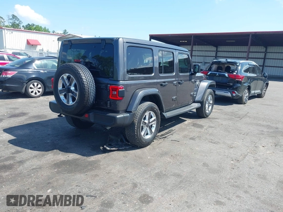 2022 Jeep Wrangler Unlimited Sahara with VIN 1C4HJXEN2NW194502, listed as a IAAI auction lot 42002455 with 34,861 mi miles and . Bid and sale history available at DreamBid. Image 4.