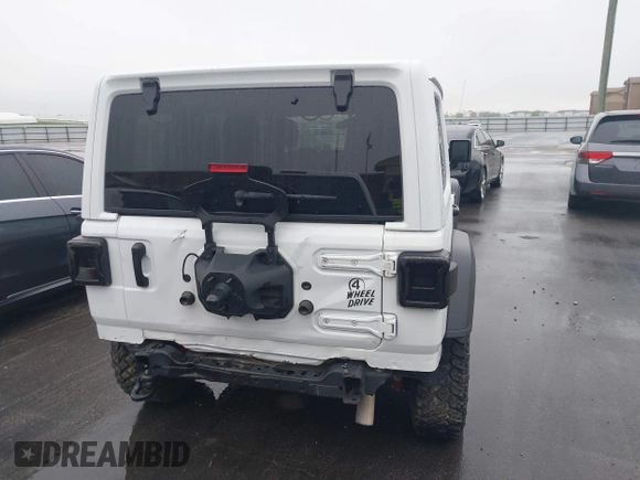 2023 Jeep Wrangler Sport with VIN 1C4HJXDN8PW523532, listed as a IAAI auction lot 41962483 with 14,643 mi miles and . Bid and sale history available at DreamBid. Image 16.