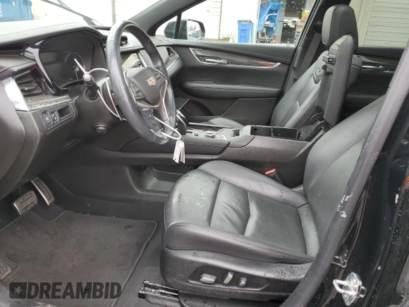 2021 Cadillac XT5 AWD Sport z VIN 1GYKNGRS3MZ158562, wystawiony jako Copart lot #43593295 z przebiegiem 32 293 mil mil oraz Szkoda całkowita • Salvage title. Historia ofert i sprzedaży dostępna na DreamBid. Obrazek 7.