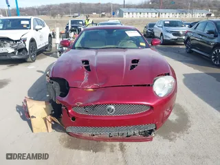 2008 Jaguar XK with VIN SAJWA43C089B22700, listed as a IAAI auction lot 41585734 with 67,946 mi miles. Bid and sale history available at carsss.com. Image 12.