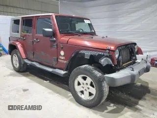 2007 Jeep Wrangler Unlimited Sahara с VIN 1J4GA591X7L198917, выставлен на аукционе Copart как лот 53311565 с пробегом 244 368 миль миль и Списание • Salvage title. История ставок и продаж доступна на DreamBid. Изображение 4.