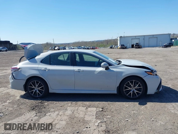 2023 Toyota Camry SE z VIN 4T1T11BK4PU102236, wystawiony jako IAAI lot #42001524 z przebiegiem 50 818 mil mil oraz . Historia ofert i sprzedaży dostępna na DreamBid. Obrazek 13.