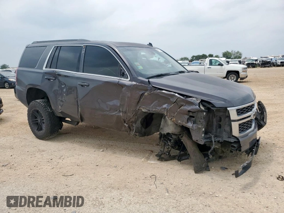 2015 Chevrolet Tahoe LT with VIN 1GNSKBKC1FR139281, listed as a Copart auction lot 57583595 with 142,090 mi miles and Salvage title. Bid and sale history available at DreamBid. Image 4.