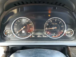 2015 BMW 7 Series 740i с VIN WBAYA6C58FD827009, выставлен на аукционе Copart как лот 50223755 с пробегом 105 440 миль миль и Списание • Salvage title. История ставок и продаж доступна на DreamBid. Изображение 9.