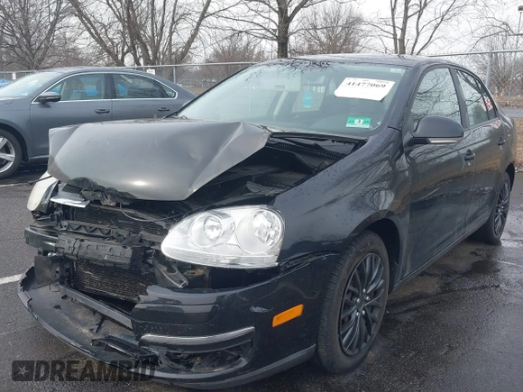 2008 Volkswagen Jetta Sedan S with VIN 3VWJZ71K18M046235, listed as a IAAI auction lot 41477069 with 123,607 mi miles. Bid and sale history available at carsss.com. Image 2.