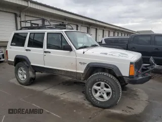 1996 Jeep Cherokee Sport with VIN 1J4FJ68S9TL284984, listed as a Copart auction lot 86307644 with 136,142 mi miles and Salvage Title. Bid and sale history available at carsss.com. Image 4.