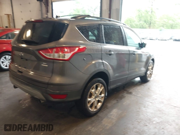 2013 Ford Escape SE z VIN 1FMCU9G91DUA98069, wystawiony jako IAAI lot #42278684 z przebiegiem 187 770 mil mil oraz . Historia ofert i sprzedaży dostępna na DreamBid. Obrazek 4.