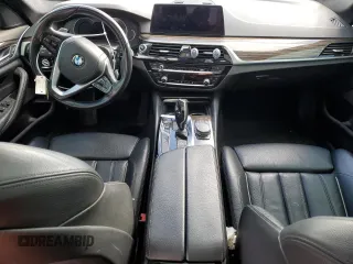 2018 BMW 5 Series 530e with VIN WBAJA9C52JG623073, listed as a Copart auction lot 82718984 with 79,543 mi miles and Clean title. Bid and sale history available at DreamBid. Image 8.