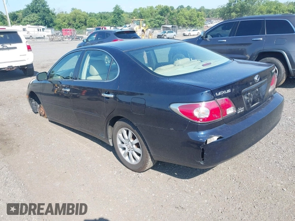 2002 Lexus ES 300 with VIN JTHBF30G020052297, listed as a IAAI auction lot 42630300 with 215,488 mi miles and . Bid and sale history available at DreamBid. Image 3.