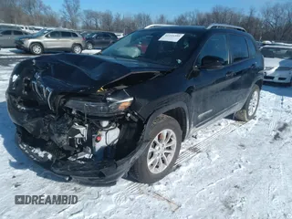 2020 Jeep Cherokee Latitude with VIN 1C4PJMCB8LD560412, listed as a IAAI auction lot 41235399 with 68,473 mi miles. Bid and sale history available at carsss.com. Image 2.