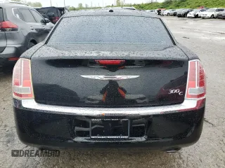 2013 Chrysler 300 with VIN 2C3CCAET1DH568910, listed as a Copart auction lot 50037004 with 136,228 mi miles and Salvage Title. Bid and sale history available at carsss.com. Image 6.