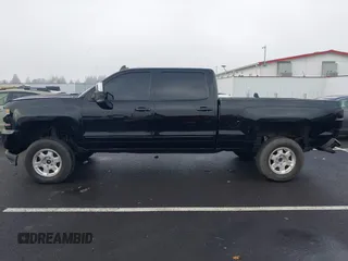 2017 Chevrolet Silverado 1500 LT with VIN 1GCUKREC1HF117744, listed as a IAAI auction lot 41091255 with 61,984 mi miles and . Bid and sale history available at DreamBid. Image 14.