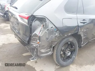 2021 Toyota RAV4 XSE with VIN JTMFB3FV7MD009432, listed as a IAAI auction lot 42439466 with 91,544 mi miles and . Bid and sale history available at DreamBid. Image 6.