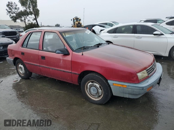 1992 Plymouth Sundance z VIN 1P3XP28D4NN165248, wystawiony jako Copart lot #44205855 z przebiegiem 70 897 mil mil oraz Czysty tytuł • Clean title. Historia ofert i sprzedaży dostępna na DreamBid. Obrazek 5.