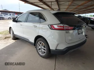 2021 Ford Edge SEL z VIN 2FMPK3J98MBA32220, wystawiony jako IAAI lot #41945825 z przebiegiem Nie podano mil oraz . Historia ofert i sprzedaży dostępna na DreamBid. Obrazek 3.