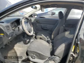 2010 Hyundai Accent GS z VIN KMHCM3AC7AU173953, wystawiony jako Copart lot #51433465 z przebiegiem 176 462 mil mil oraz Szkoda całkowita • Salvage title. Historia ofert i sprzedaży dostępna na DreamBid. Obrazek 7.