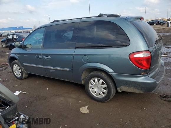 2006 Chrysler Town & Country Touring with VIN 2A4GP54L96R618650, listed as a Copart auction lot 52519325 with 130,234 mi miles and Salvage title. Bid and sale history available at DreamBid. Image 2.