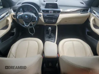 2018 BMW X1 xDrive28i with VIN WBXHT3C35J5F90062, listed as a Copart auction lot 56284945 with 138,137 mi miles and Salvage title. Bid and sale history available at DreamBid. Image 8.