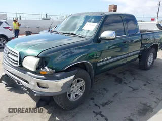 2000 Toyota Tundra SR5 with VIN 5TBRT3417YS122889, listed as a IAAI auction lot 41711107 with 288,475 mi miles and . Bid and sale history available at DreamBid. Image 6.