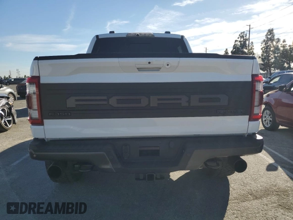 2022 Ford F-150 Raptor with VIN 1FTFW1RG4NFB63687, listed as a Copart auction lot 87479684 with 32,921 mi miles and Salvage Title. Bid and sale history available at carsss.com. Image 6.