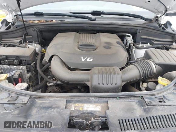 2015 Dodge Durango SXT with VIN 1C4RDJAG4FC760713, listed as a IAAI auction lot 41707354 with 174,216 mi miles and . Bid and sale history available at carsss.com. Image 10.