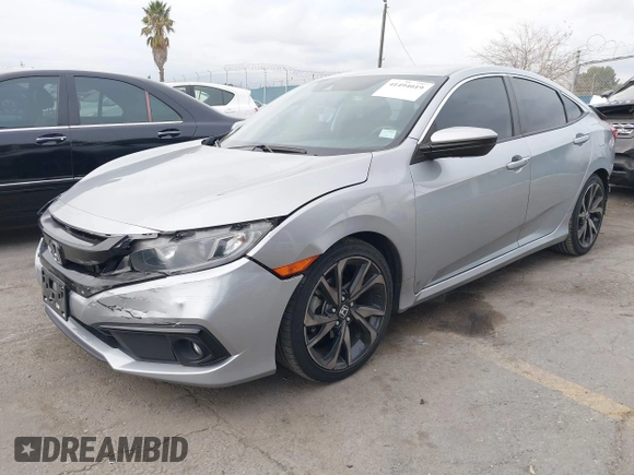 2019 Honda Civic Sport with VIN 2HGFC2F84KH576622, listed as a IAAI auction lot 41494019 with 87,495 mi miles and . Bid and sale history available at DreamBid. Image 2.
