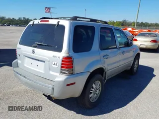 2005 Mercury Mariner Luxury z VIN 4M2YU57155DJ07235, wystawiony jako IAAI lot #40687176 z przebiegiem 193 237 mil mil oraz . Historia ofert i sprzedaży dostępna na DreamBid. Obrazek 4.