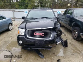 2004 GMC Envoy SLT with VIN 1GKDT13S942279670, listed as a Copart auction lot 73527974 with 120,425 mi miles and Salvage Title. Bid and sale history available at DreamBid. Image 5.