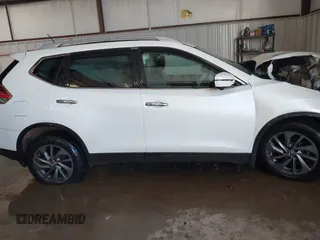 2016 Nissan Rogue SL with VIN 5N1AT2MV0GC770880, listed as a IAAI auction lot 41398955 with Not Provided miles and . Bid and sale history available at DreamBid. Image 14.