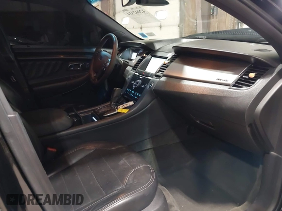 2015 Ford Taurus SHO with VIN 1FAHP2KT0FG132988, listed as a IAAI auction lot 42042314 with 192,974 mi miles and . Bid and sale history available at DreamBid. Image 5.