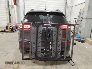 2018 Jeep Cherokee Trailhawk with VIN 1C4PJMBB8JD599791, listed as a Copart auction lot 86650054 with 66,360 mi miles and Non Repairable. Bid and sale history available at DreamBid. Image 6.