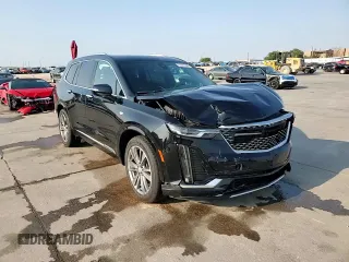 2021 Cadillac XT6 Premium Luxury z VIN 1GYKPCRS3MZ195999, wystawiony jako Copart lot #53261595 z przebiegiem 81 843 mil mil oraz Szkoda całkowita • Salvage title. Historia ofert i sprzedaży dostępna na DreamBid. Obrazek 14.