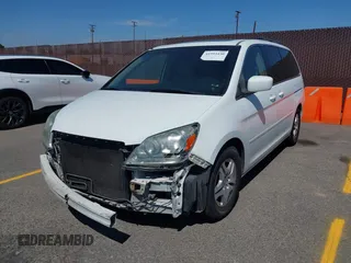 2005 Honda Odyssey TOURING with VIN 5FNRL38865B083615, listed as a IAAI auction lot 41993430 with 86,636 mi miles. Bid and sale history available at carsss.com. Image 2.