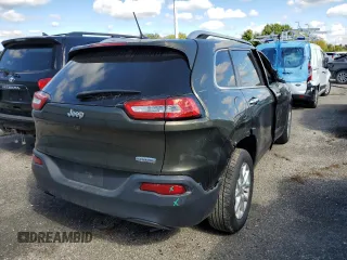 2015 Jeep Cherokee Latitude with VIN 1C4PJLCB3FW720876, listed as a Copart auction lot 54414872 with 82,413 mi miles and Salvage Title. Bid and sale history available at carsss.com. Image 4.