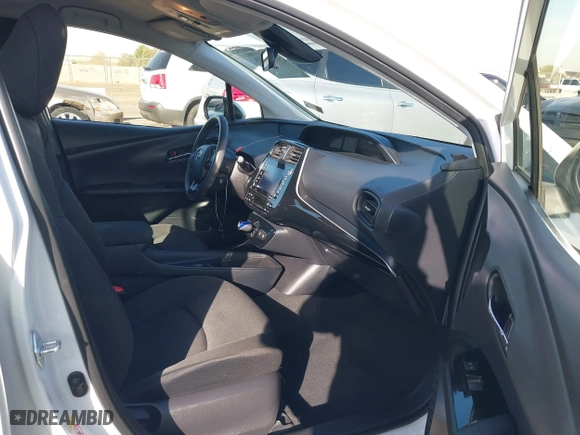 2021 Toyota Prius L Eco with VIN JTDKAMFU7M3133544, listed as a IAAI auction lot 41548653 with 115,214 mi miles. Bid and sale history available at carsss.com. Image 5.