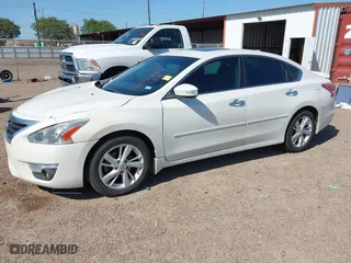 2015 Nissan Altima 2.5 S with VIN 1N4AL3AP6FC127096, listed as a IAAI auction lot 41954022 with 87,577 mi miles. Bid and sale history available at carsss.com. Image 2.